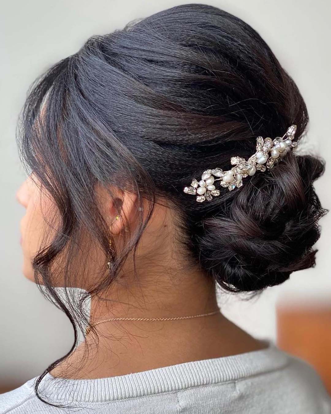 black women wedding hairstyles elegant low bun with pin haircomesthebride