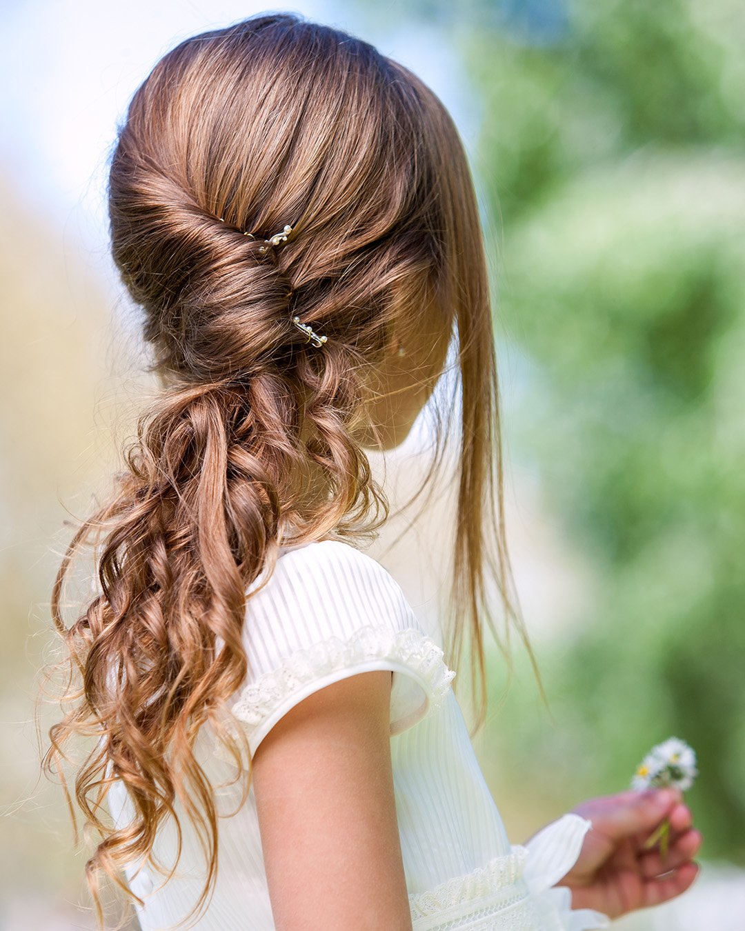 flower girl hairstyles easy swept ponytail shutterstock