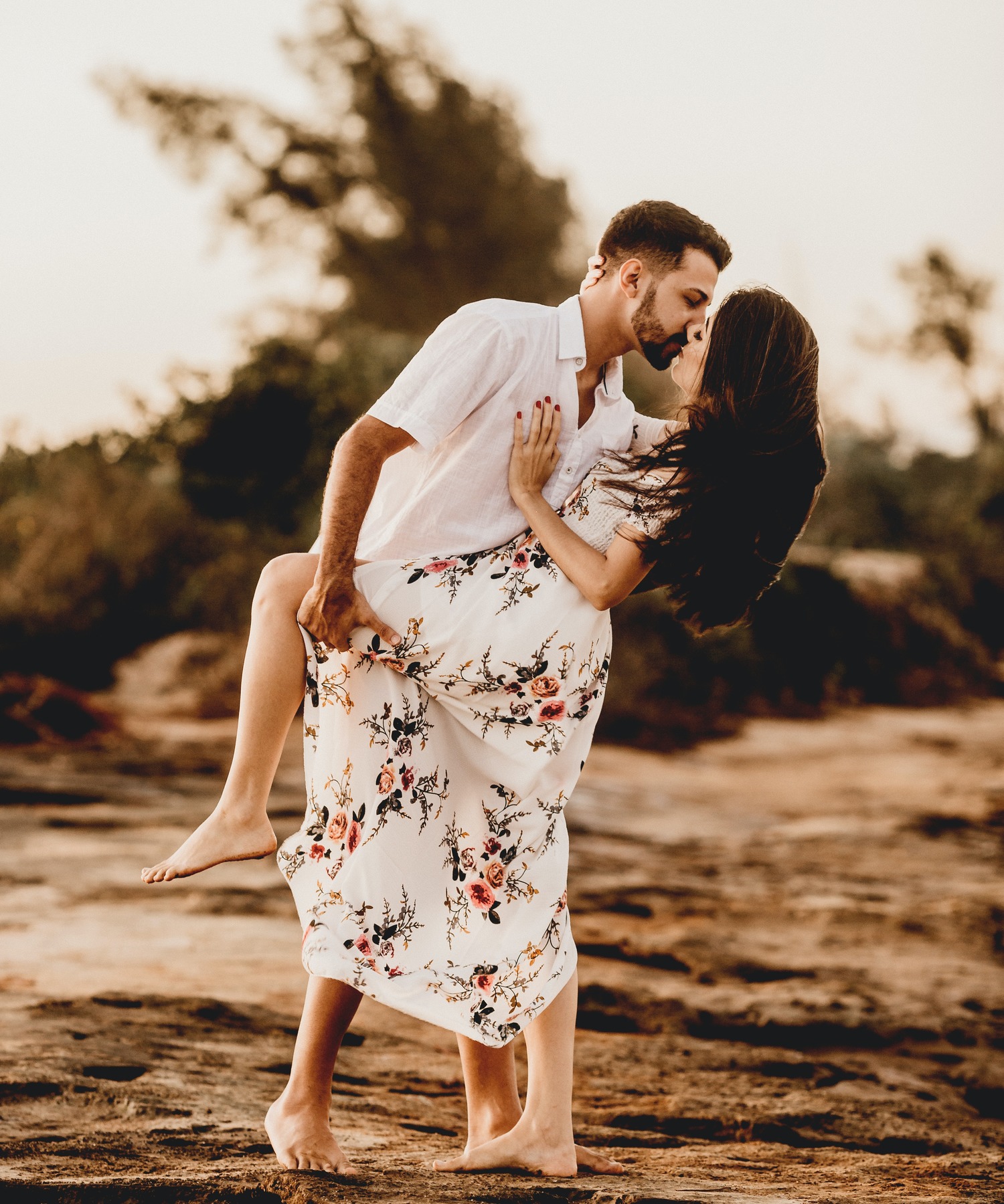 Free Photo | Romantic moments of beautiful couple, fashionable woman and  man posing outdoor near the sea. amazing blue dress and casual outfit.  honeymoon vacation.
