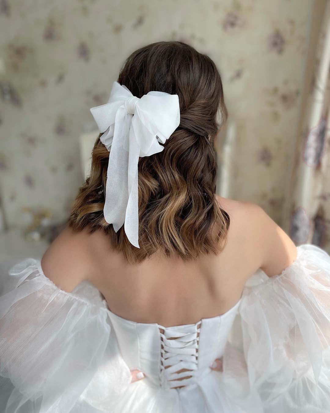 wedding hairstyles for short hair half up with white bow by_telegina