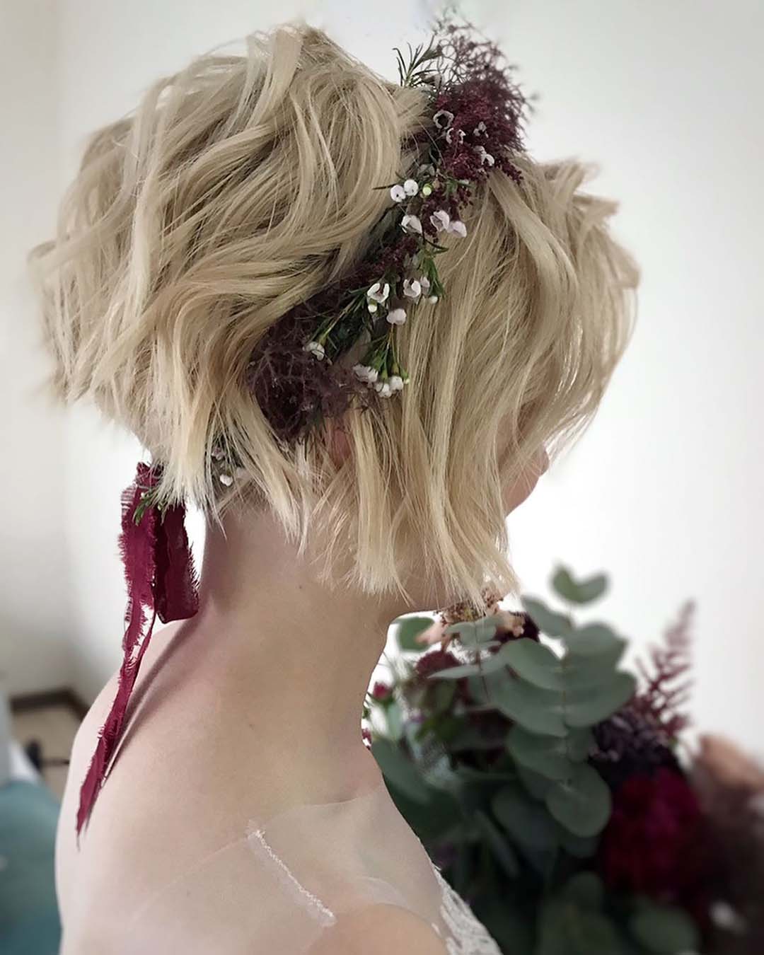 wedding hairstyles for short hair wavy messy bob with flower band julia_alesionok