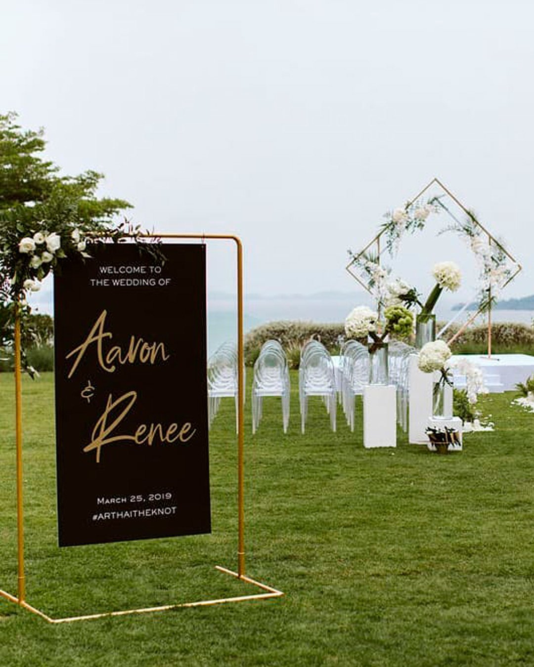 black and gold wedding theme sign