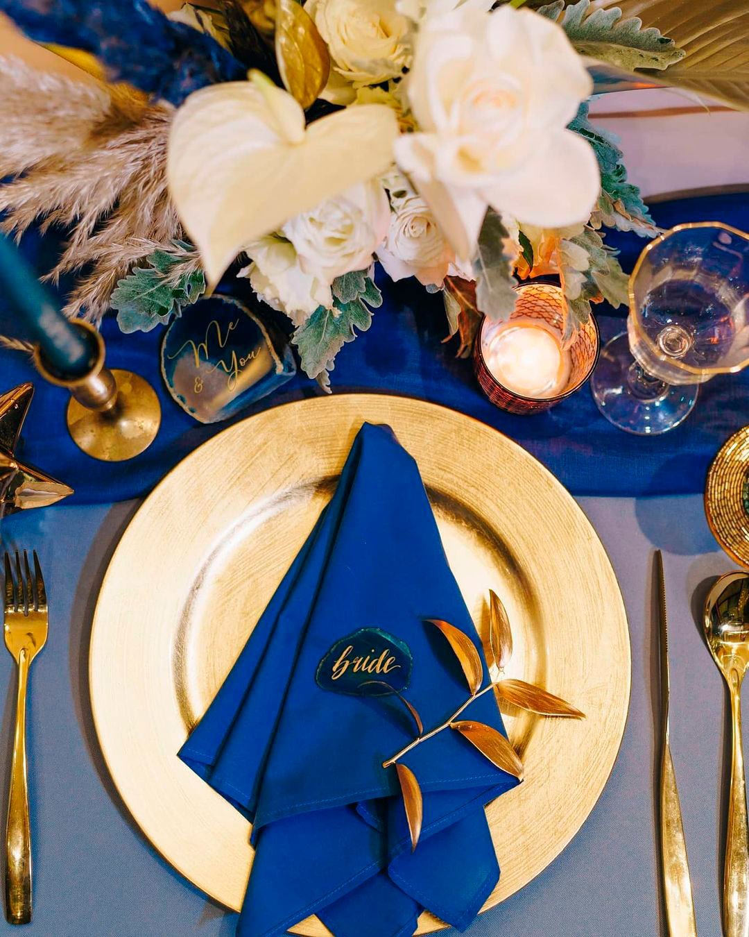 blue and gold wedding theme table setting