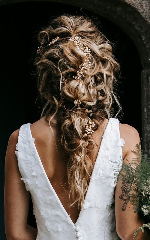 Best 31 Braided Bun Hairstyles For Brides-To-Be! | WeddingBazaar