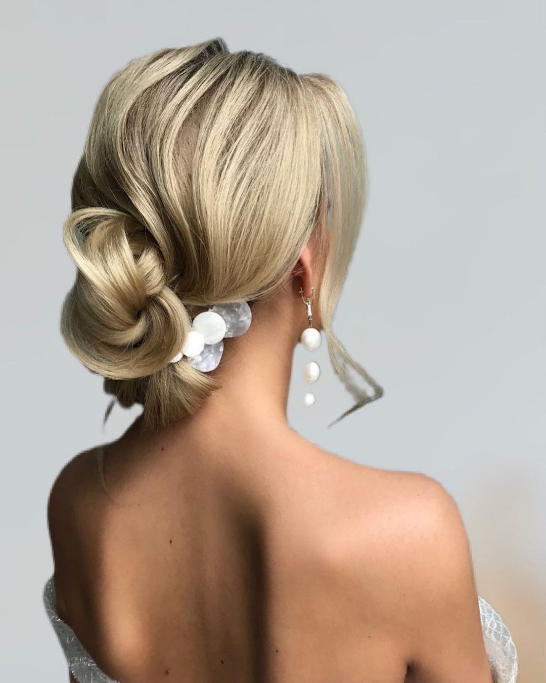 low bun hairstyles for wedding elegant smooth wavy art4studio