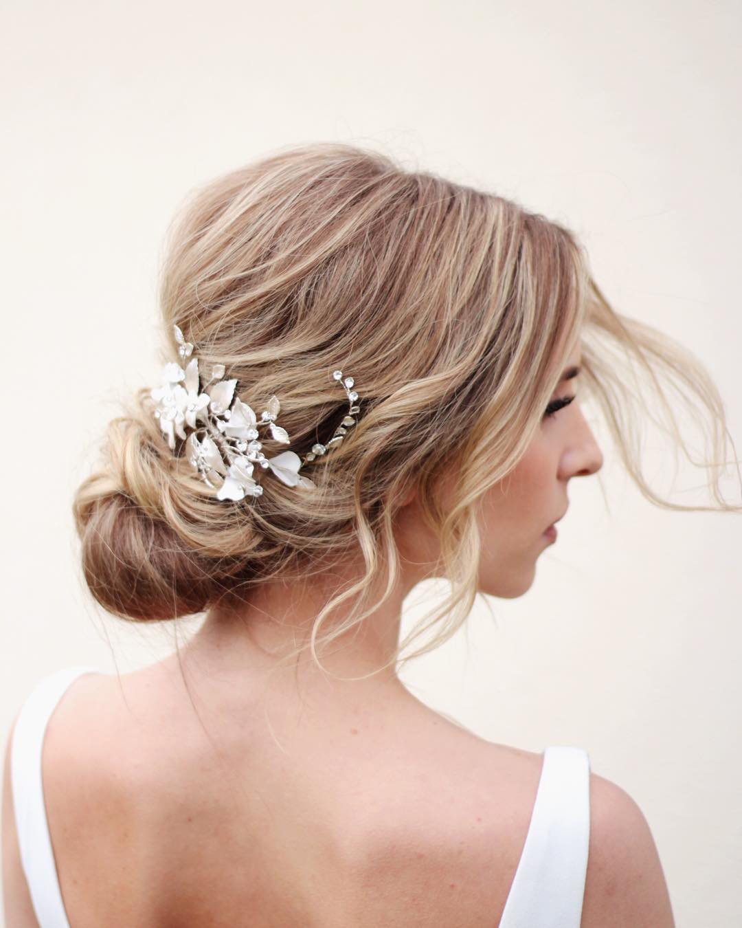 low bun hairstyles for wedding relaxed classy slmakeupandhair