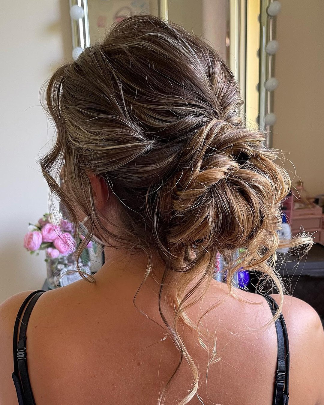 low bun hairstyles for wedding slightly messy loose curls irinafarfallina