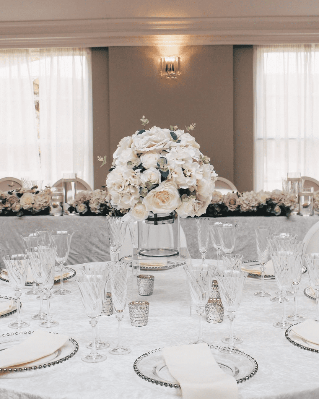 modern wedding decor white and silver plates and glasses