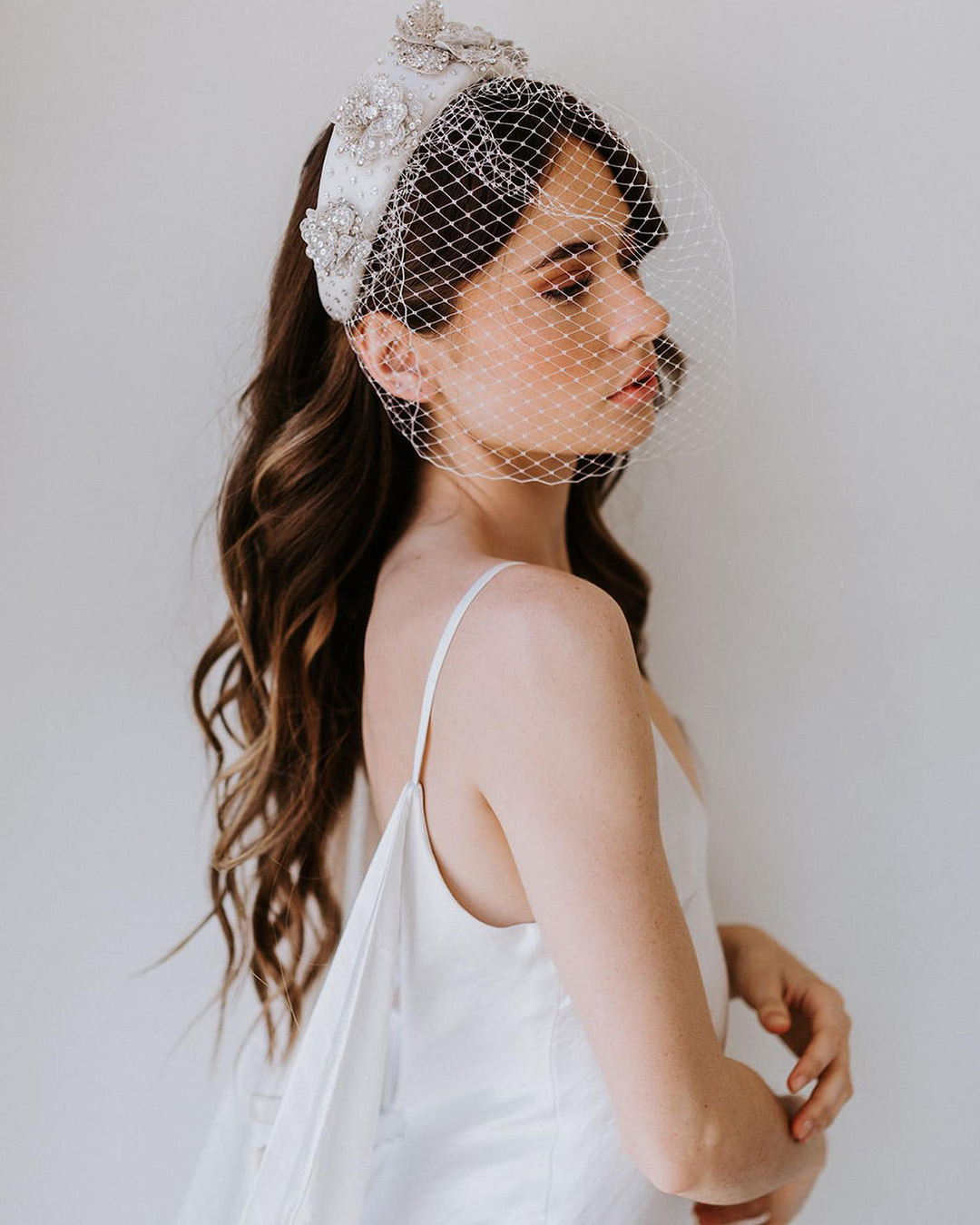 old hollywood wedding hair headband with birdcage untamedpetals