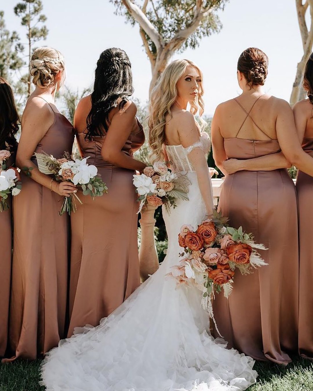 rust wedding theme bridesmaid from back thelittlebranch