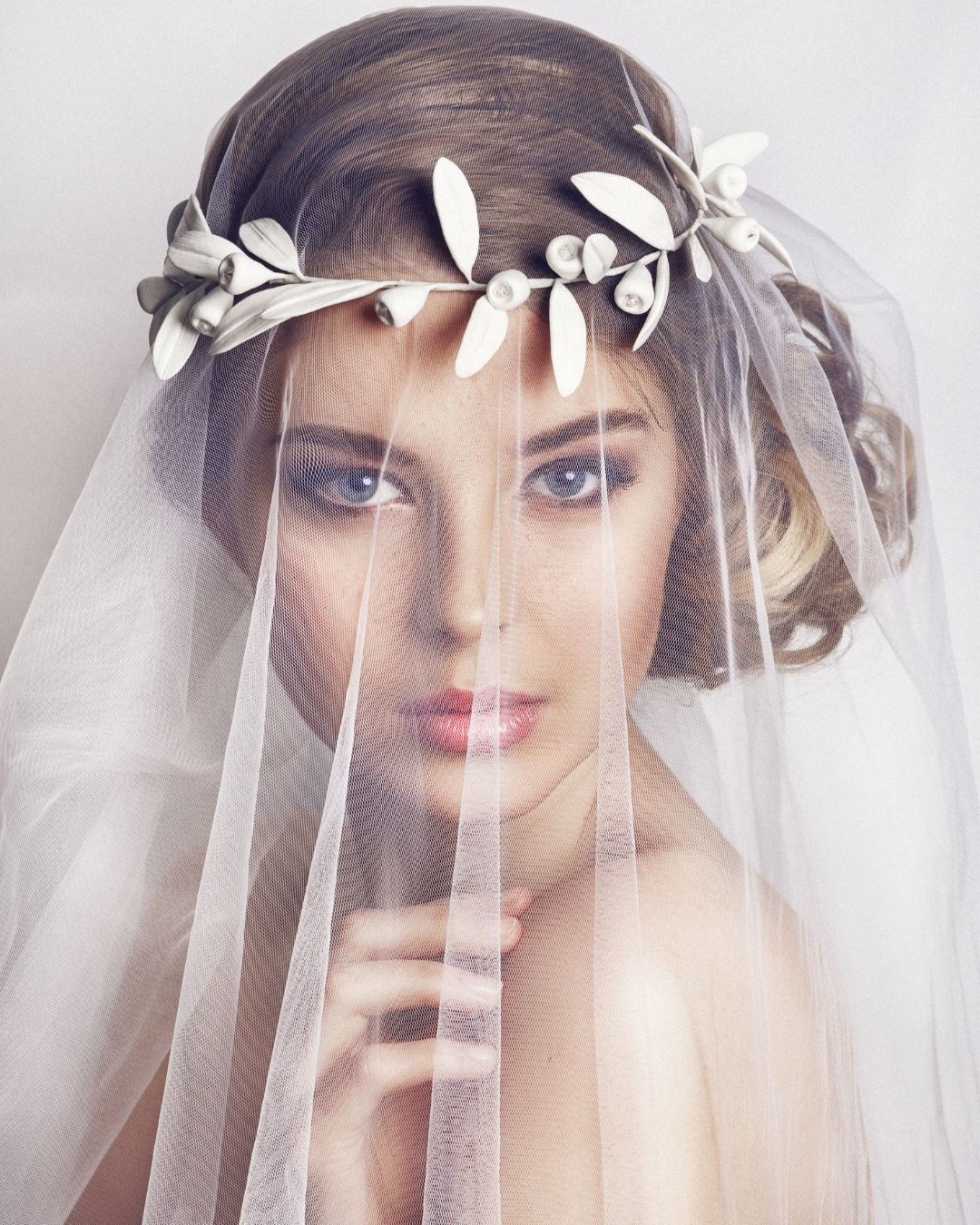 side buns wedding hairstyles with veil