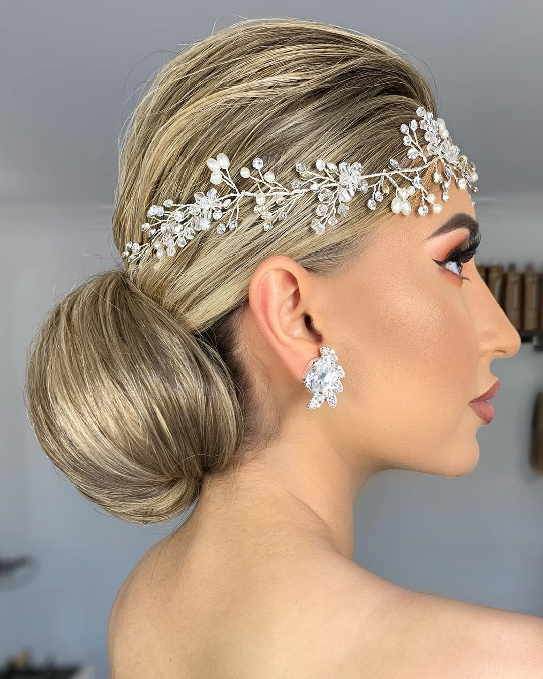 spring wedding hairstyles elegant chignon with crystal halo kykhair