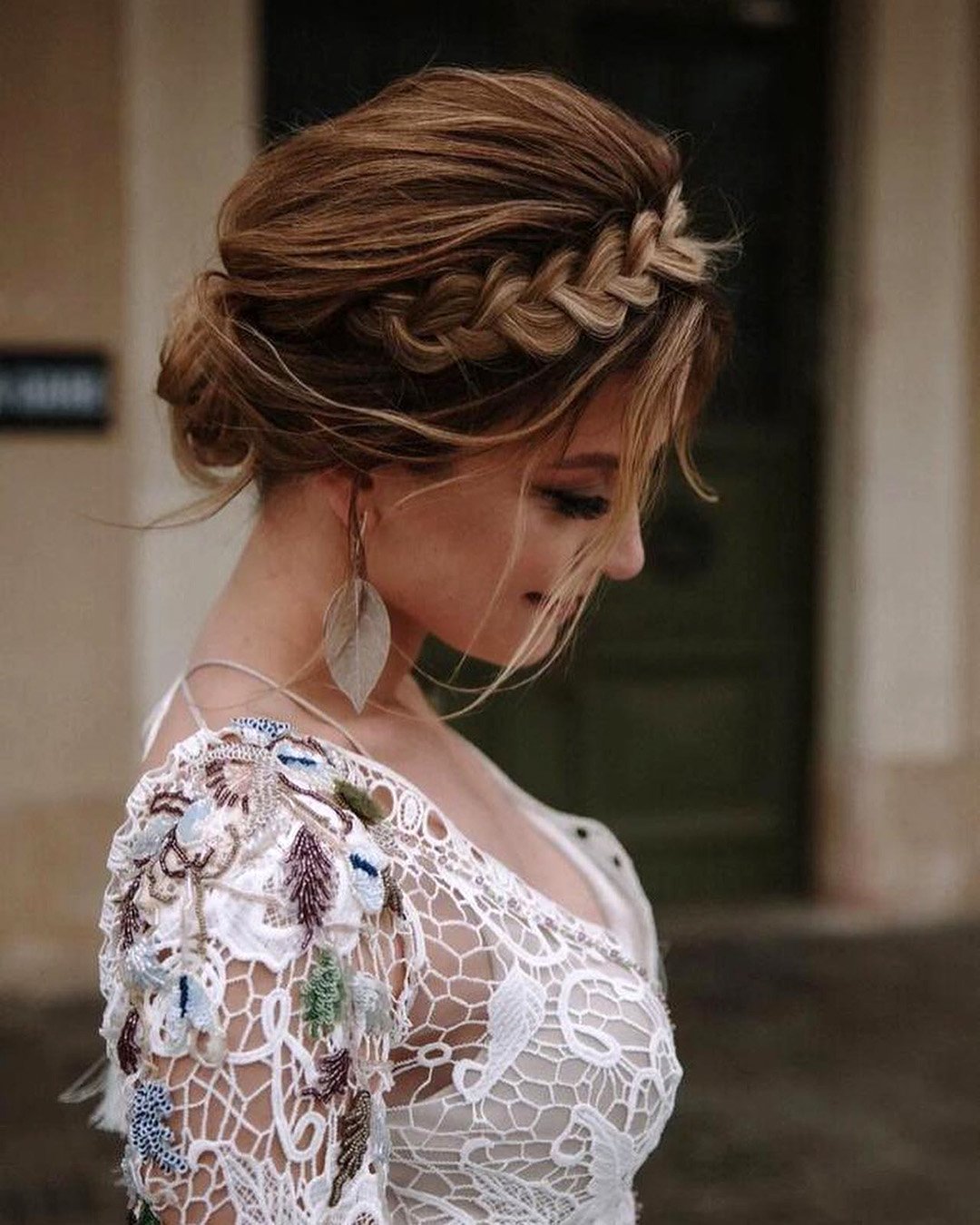 spring wedding hairstyles simple low bun with braided crown nikabelyanka