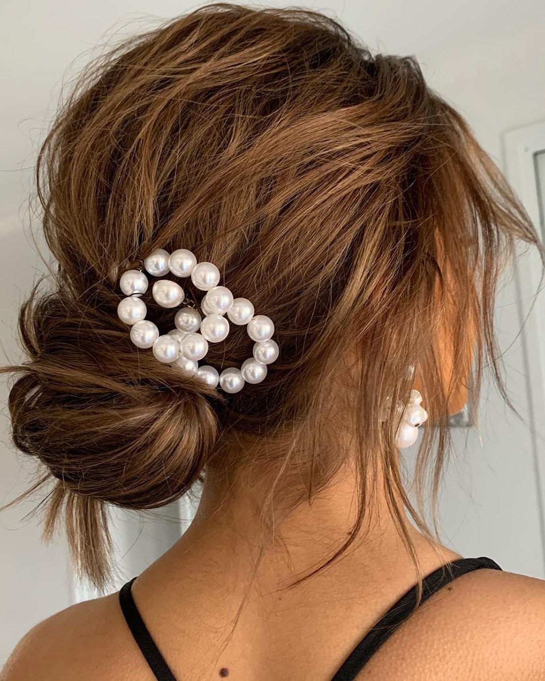 spring wedding hairstyles slightly messy updo pearl pin kykhair