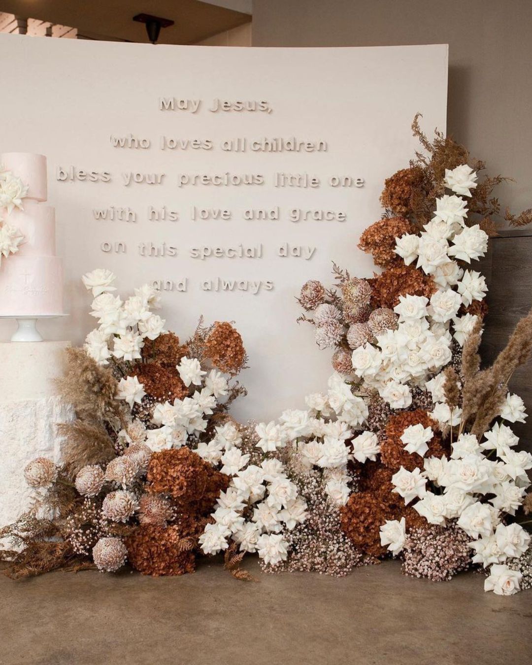 rust manor wedding signs with floral decor
