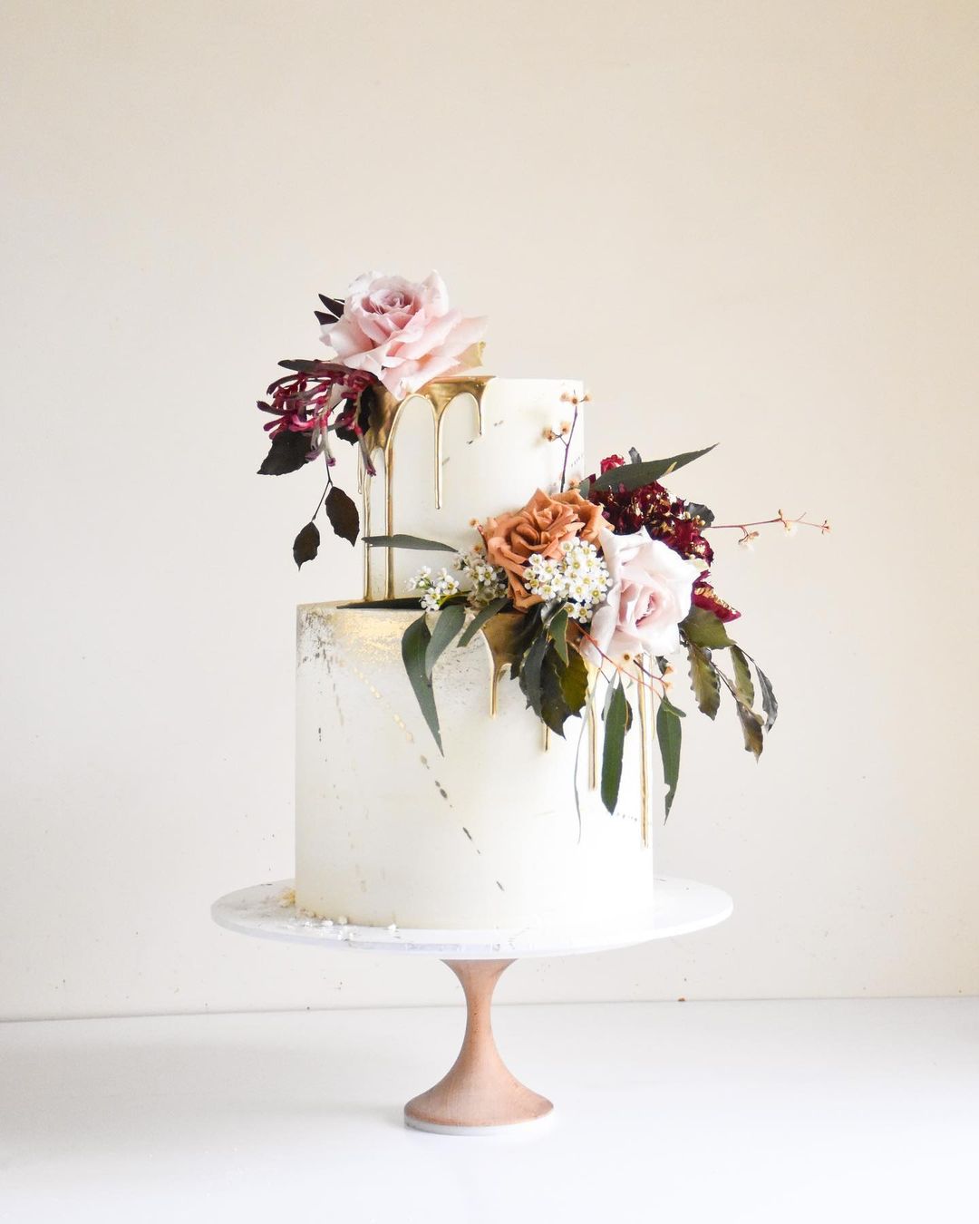 sage rust wedding cake flowers