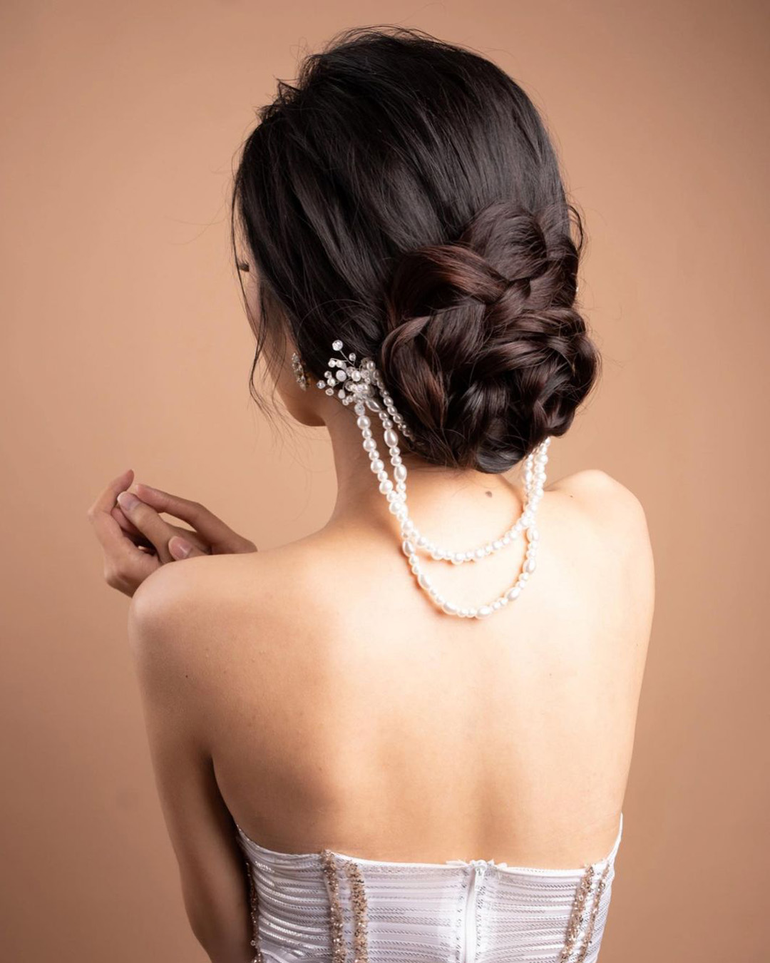 asian wedding hairstyles braided low bun with pearls atenikks