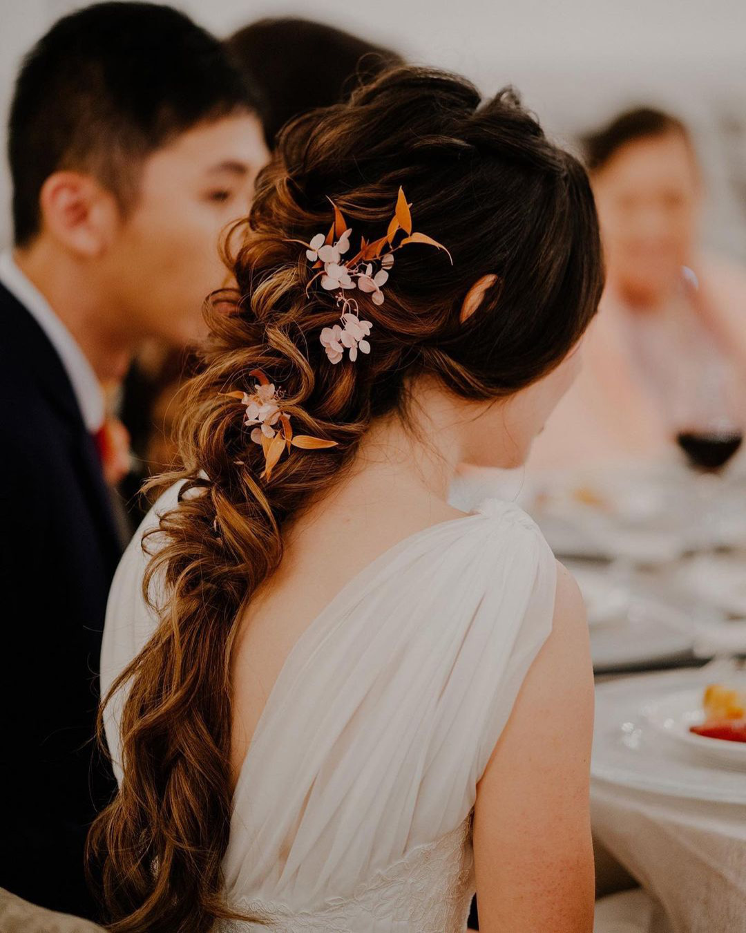 asian wedding hairstyles curly cascading braid on long hair christinechiamakeup