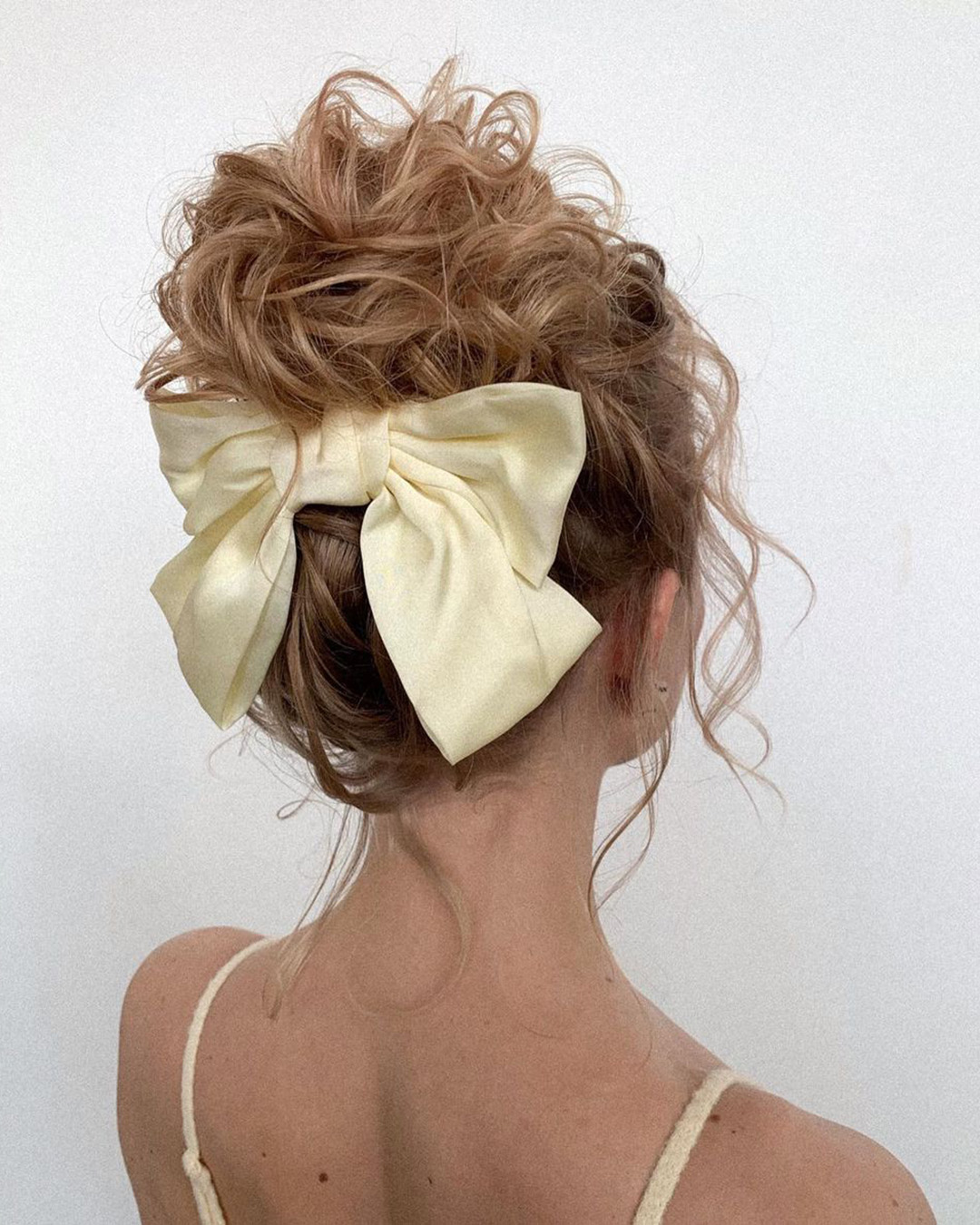 bridal barrette textured updo with creamy bow clip nadi_lanova