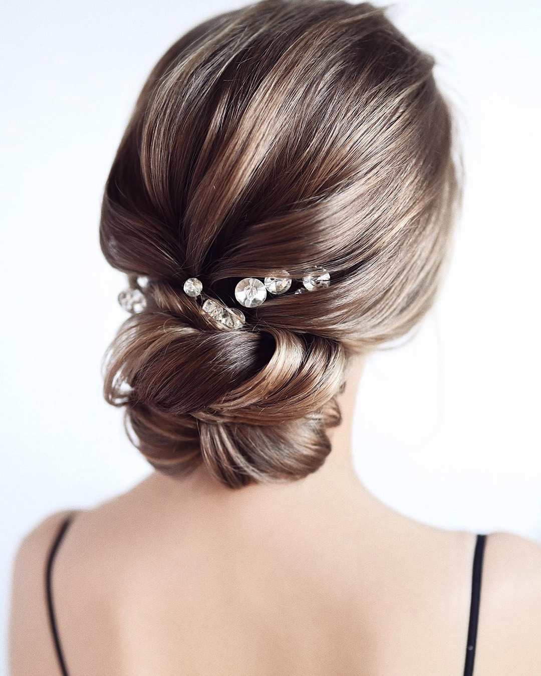 bridal hair pins crystal round on low bun tonyastylist