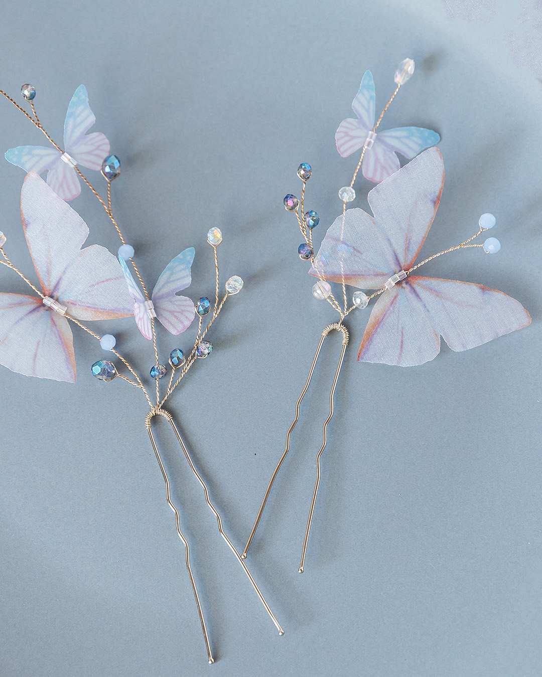 bridal hair pins with butterflies light blue and beads shutterstock