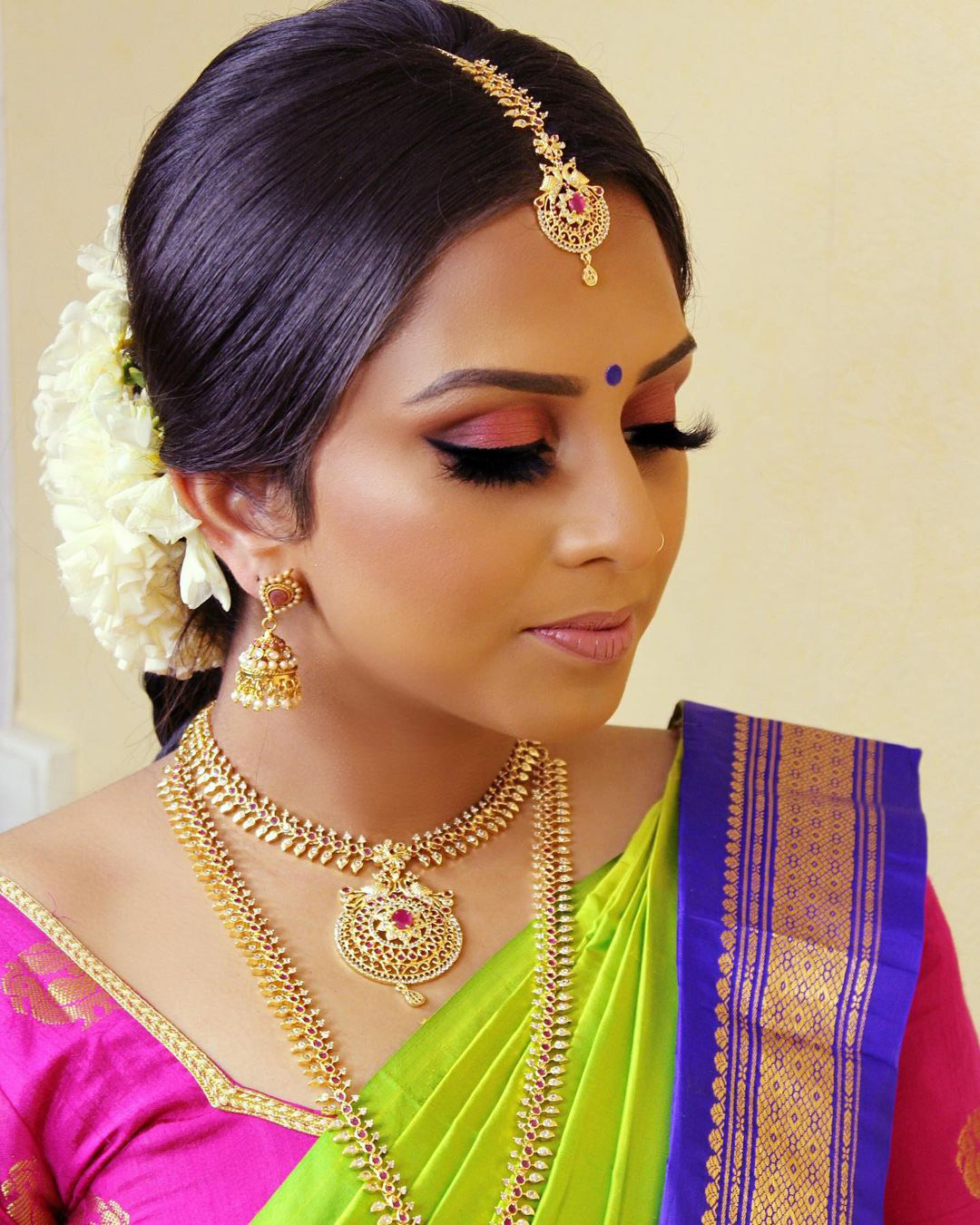 indian bridal makeup black arrows long lashes pink eyeshadows theparismakeup