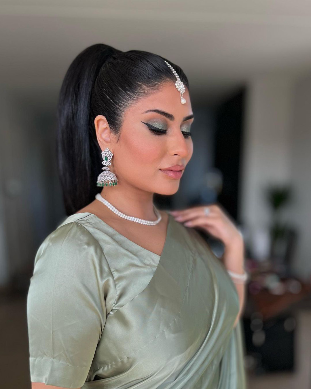 indian bridal makeup glam with arrows and green shimmer eyeshadows cathrineheierenhansen