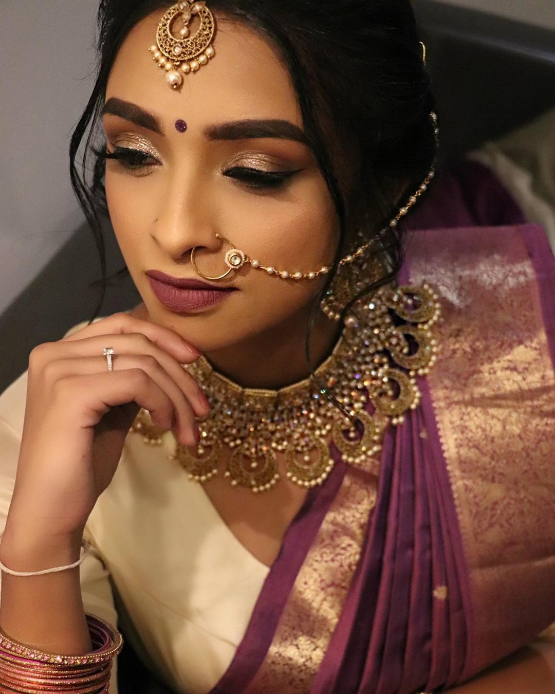 indian bridal makeup matte lips gold shimmer eyes black arrows theparismakeup