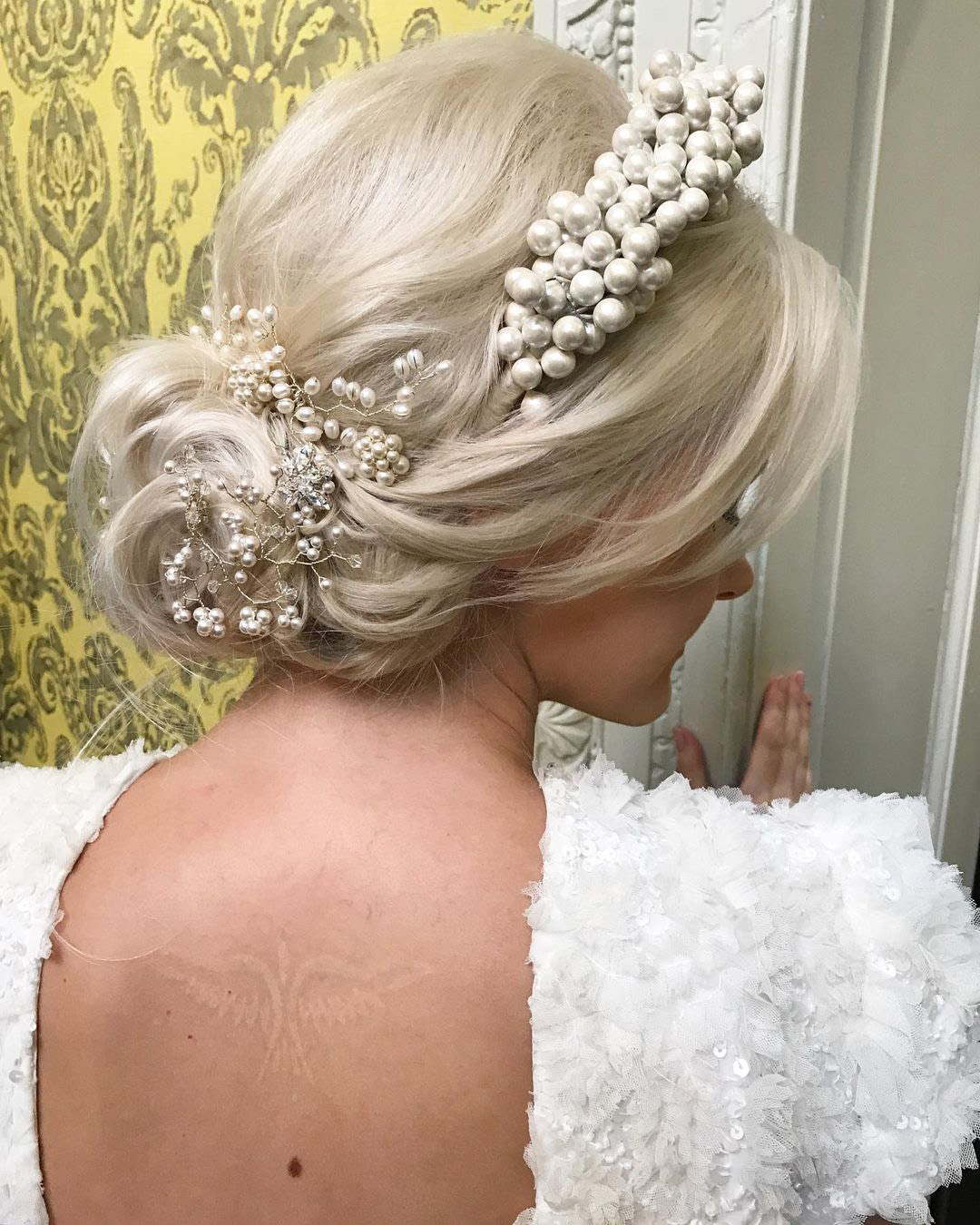 wedding hairstyles headband low blonde bun with pearls botiashairandmakeup