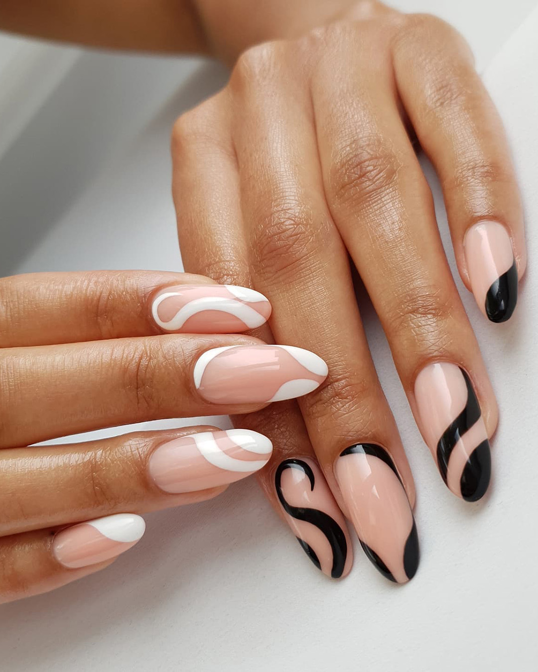 black wedding nails with white on another hand thehotblend