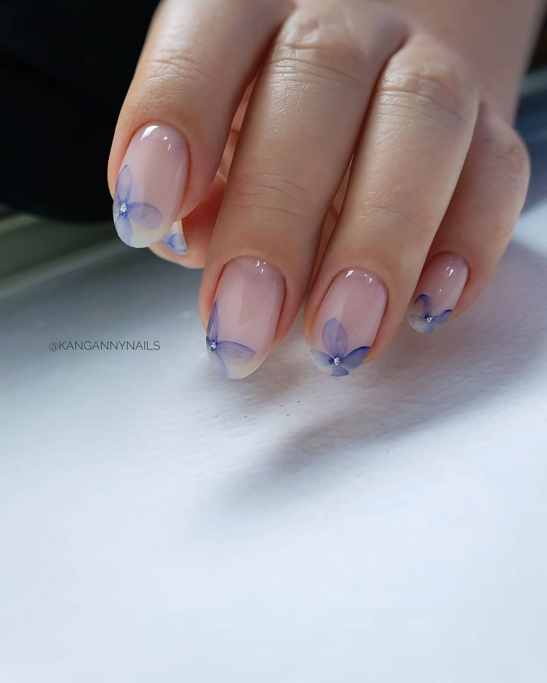 nude wedding nails with blue petals kangannynails