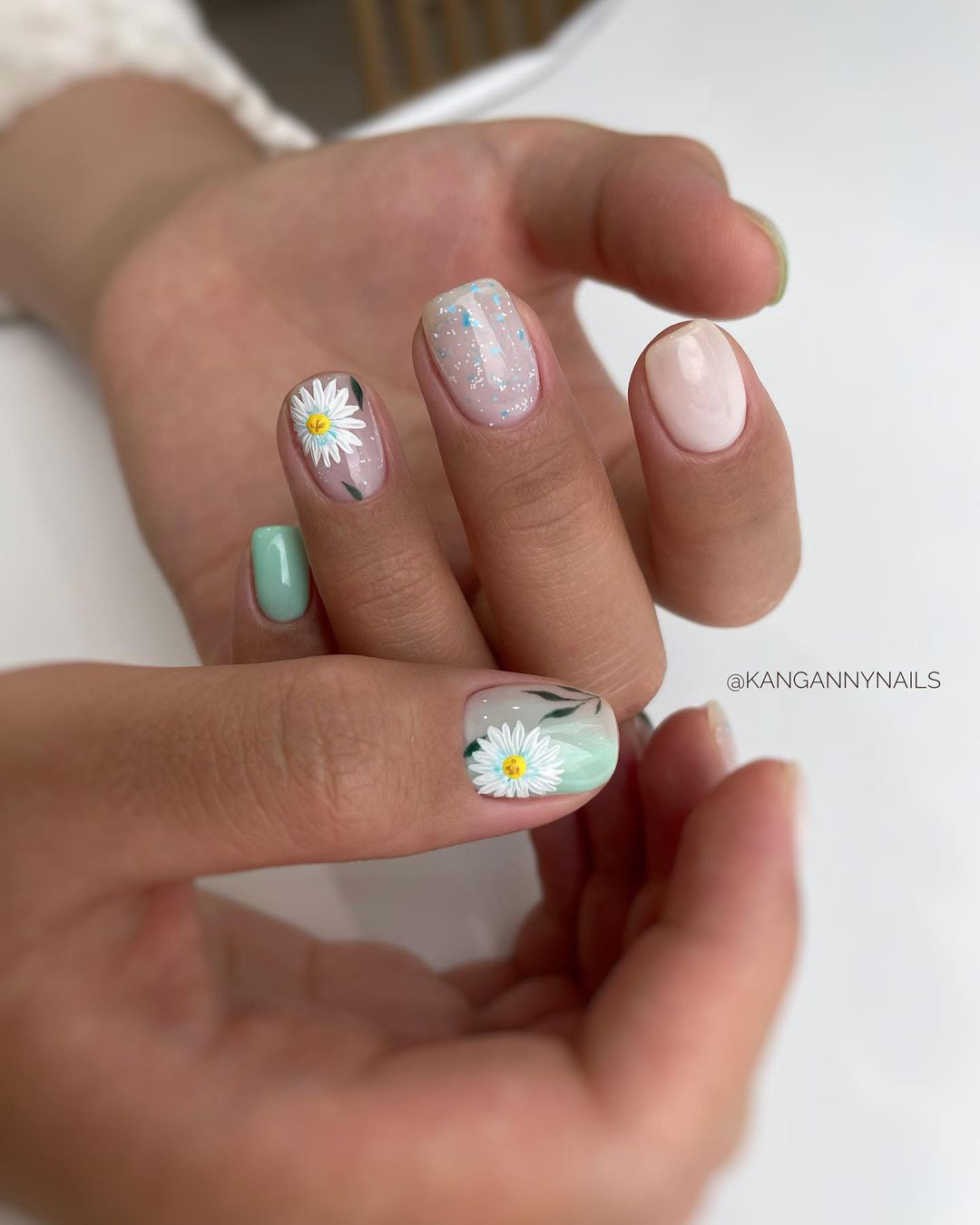 nude wedding nails with painted white flowers kangannynails