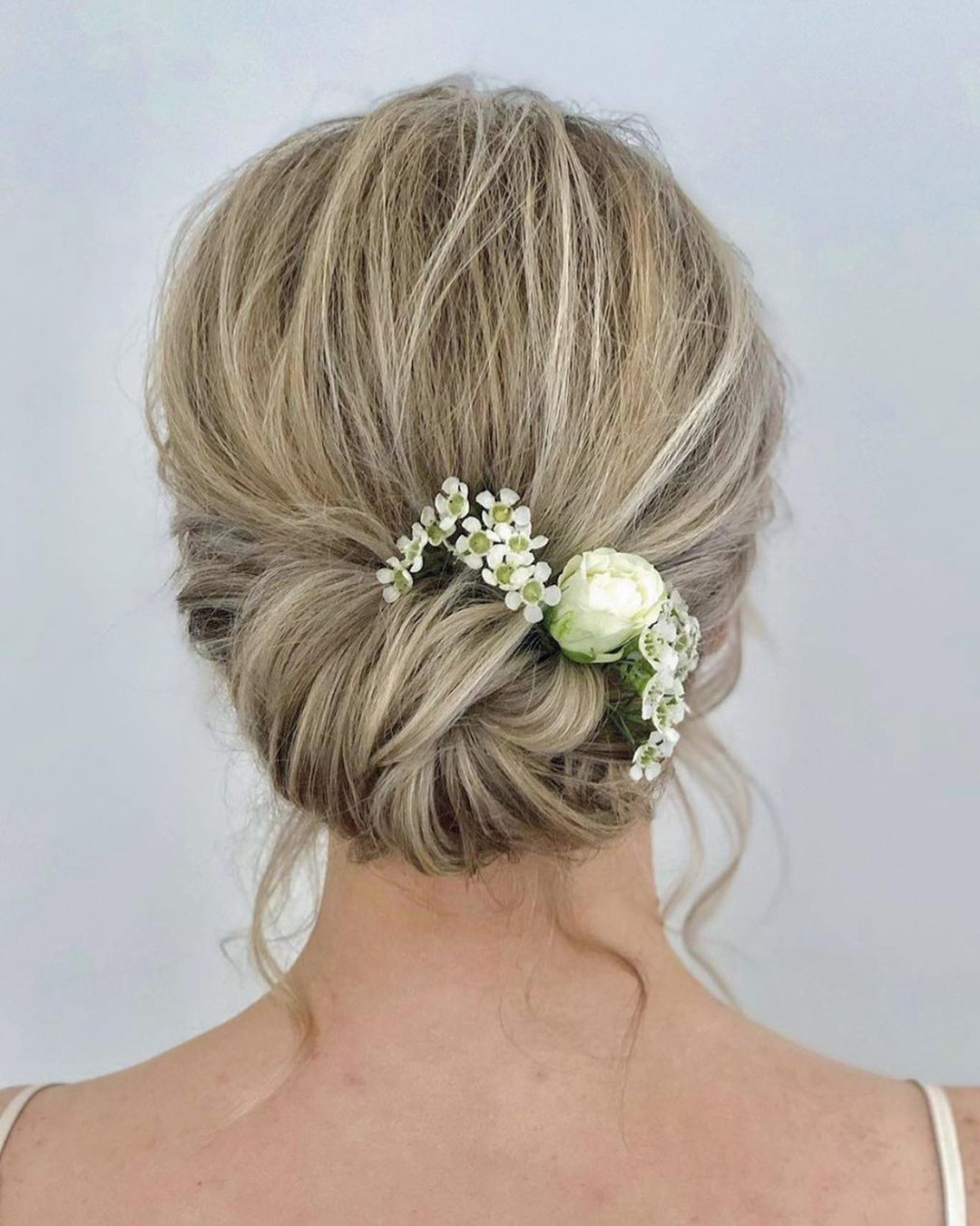pin up wedding hairstyles low bun with flowers monamieweddinghair