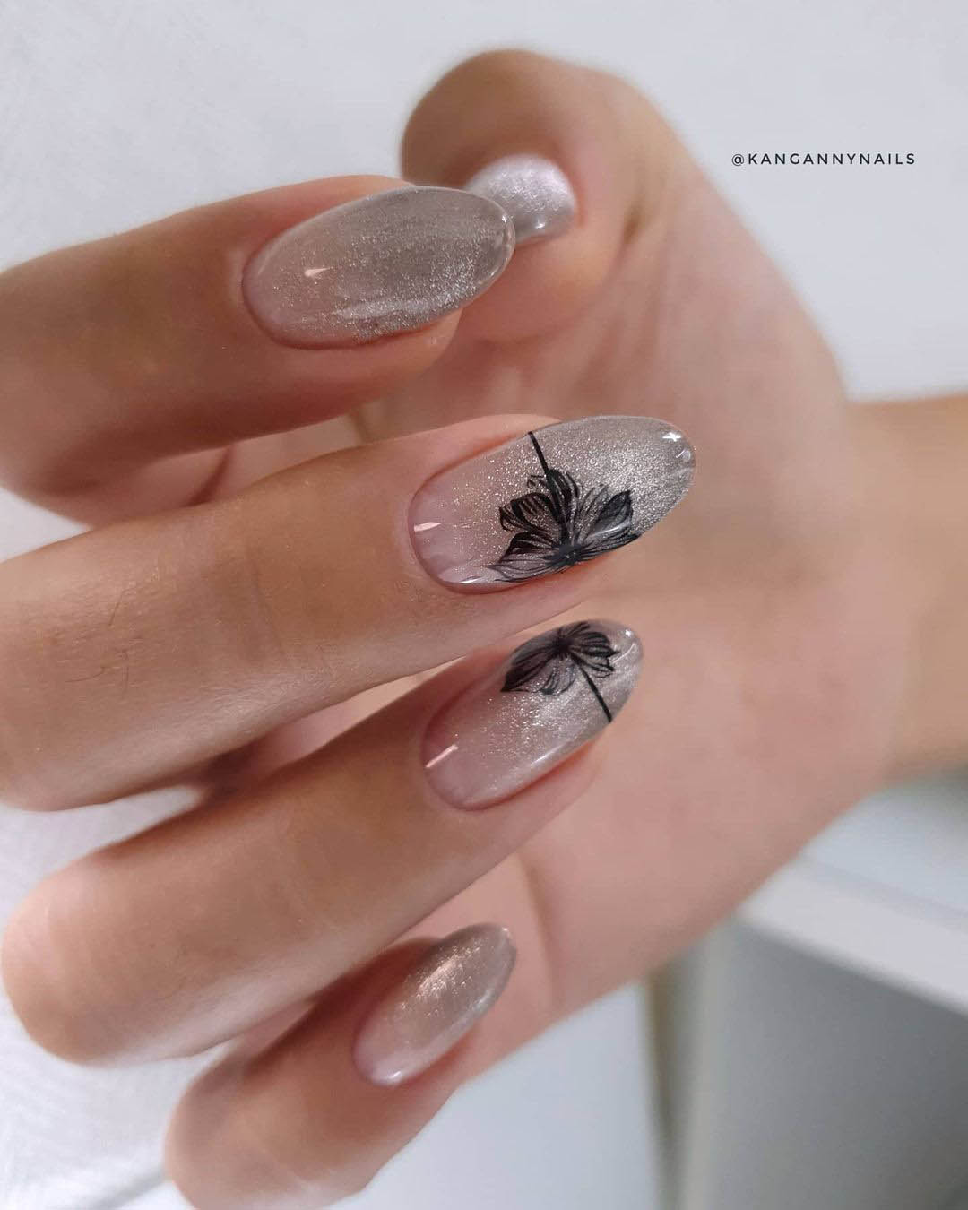 wedding nails with glitter nude with black flowers kangannynails
