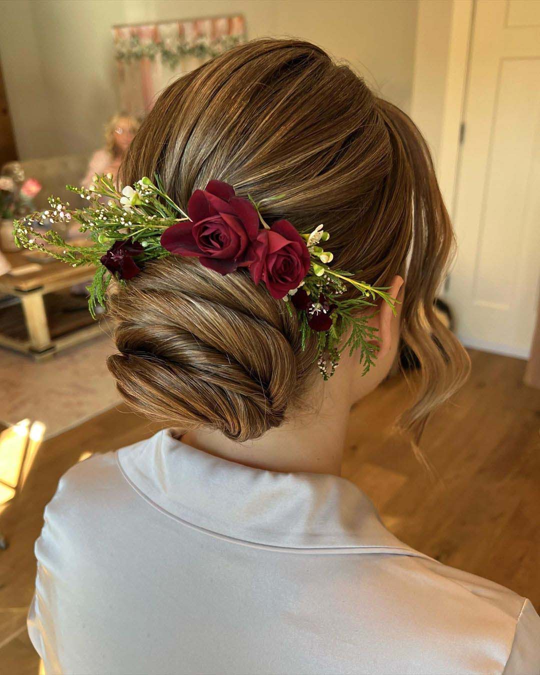bridesmaid hairstyles low bun with red roses amandafioritahair