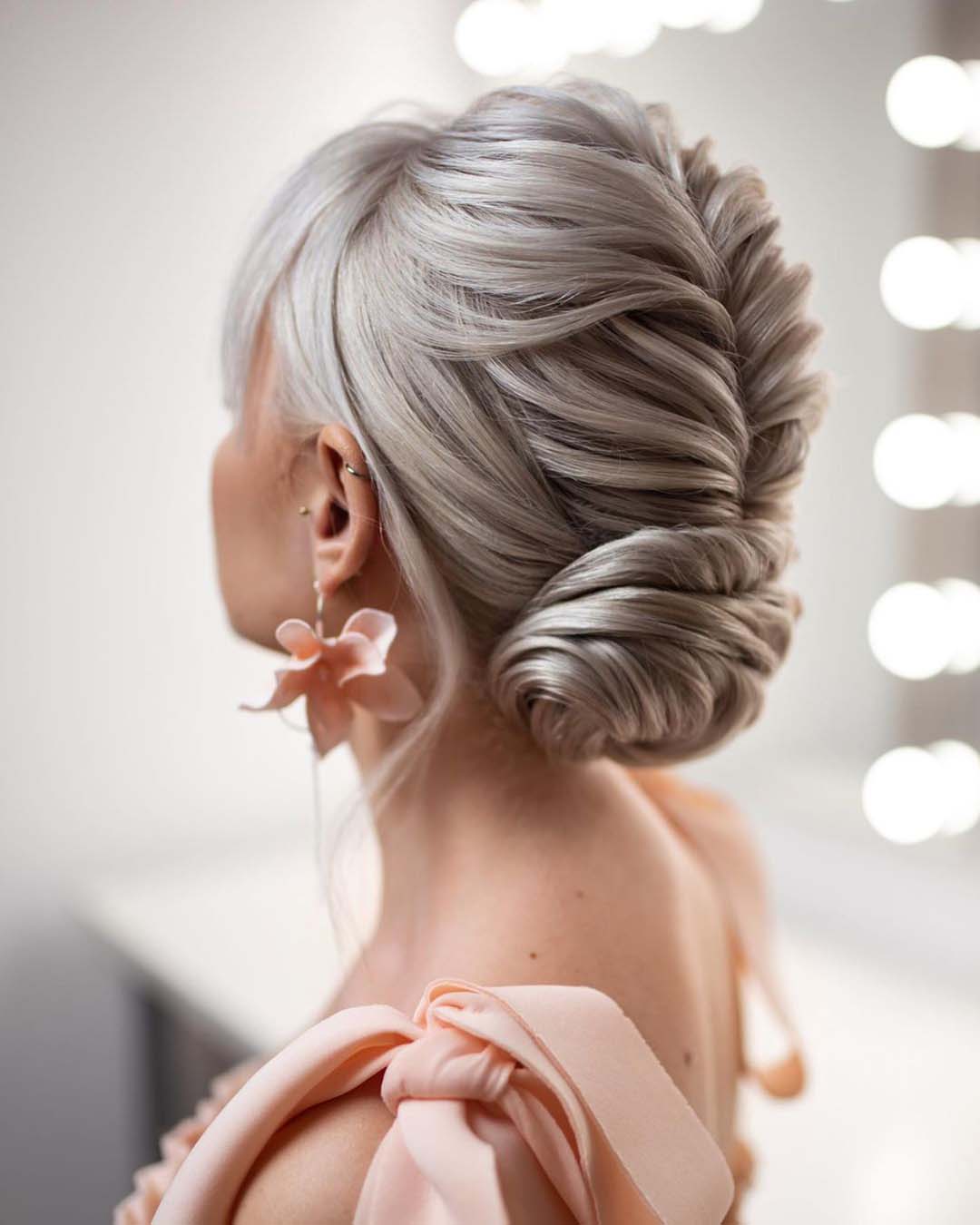 bridesmaid hairstyles textured braided low bun beautybyrockagirl