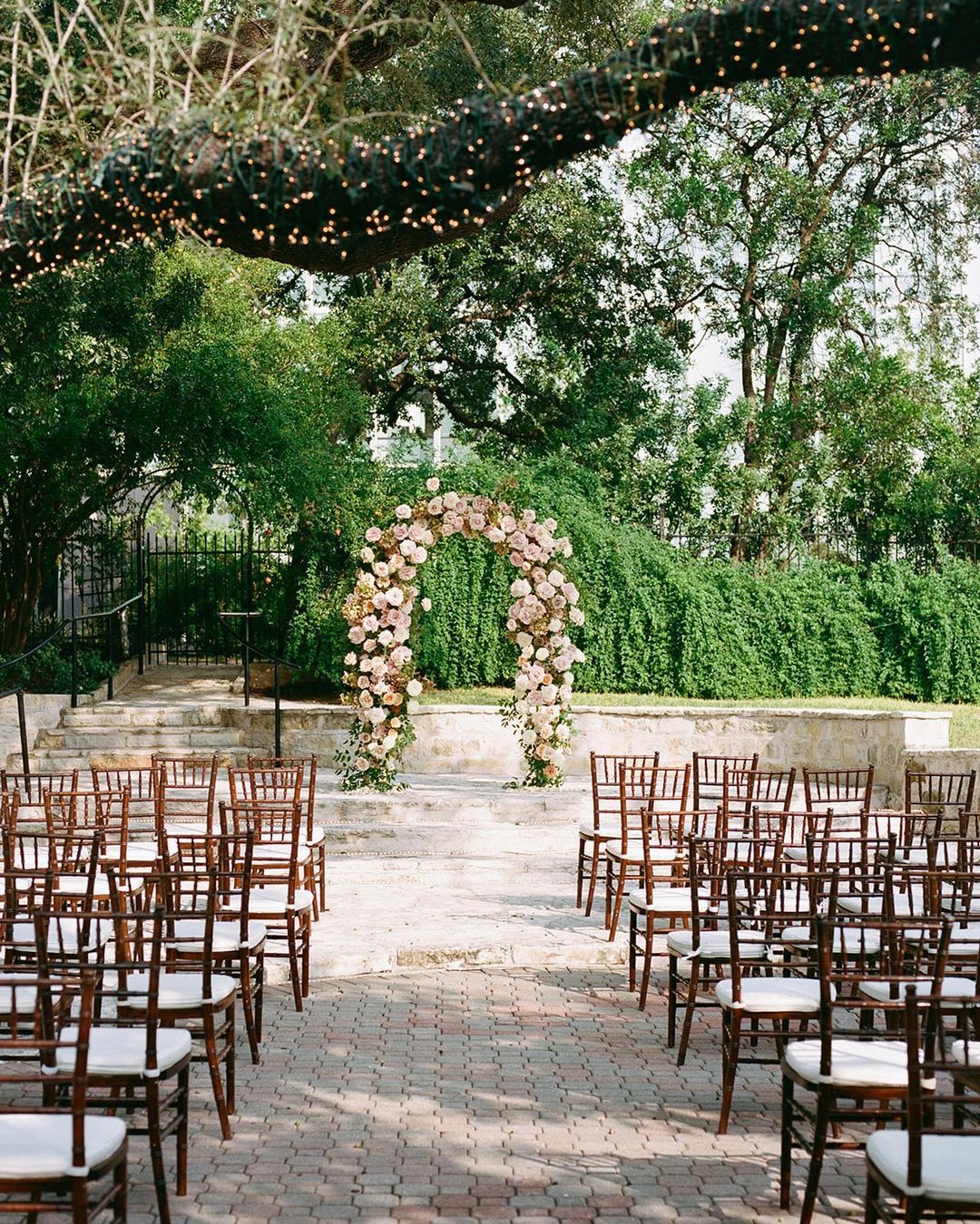 wedding venues in austin aisle arch flowers chairs