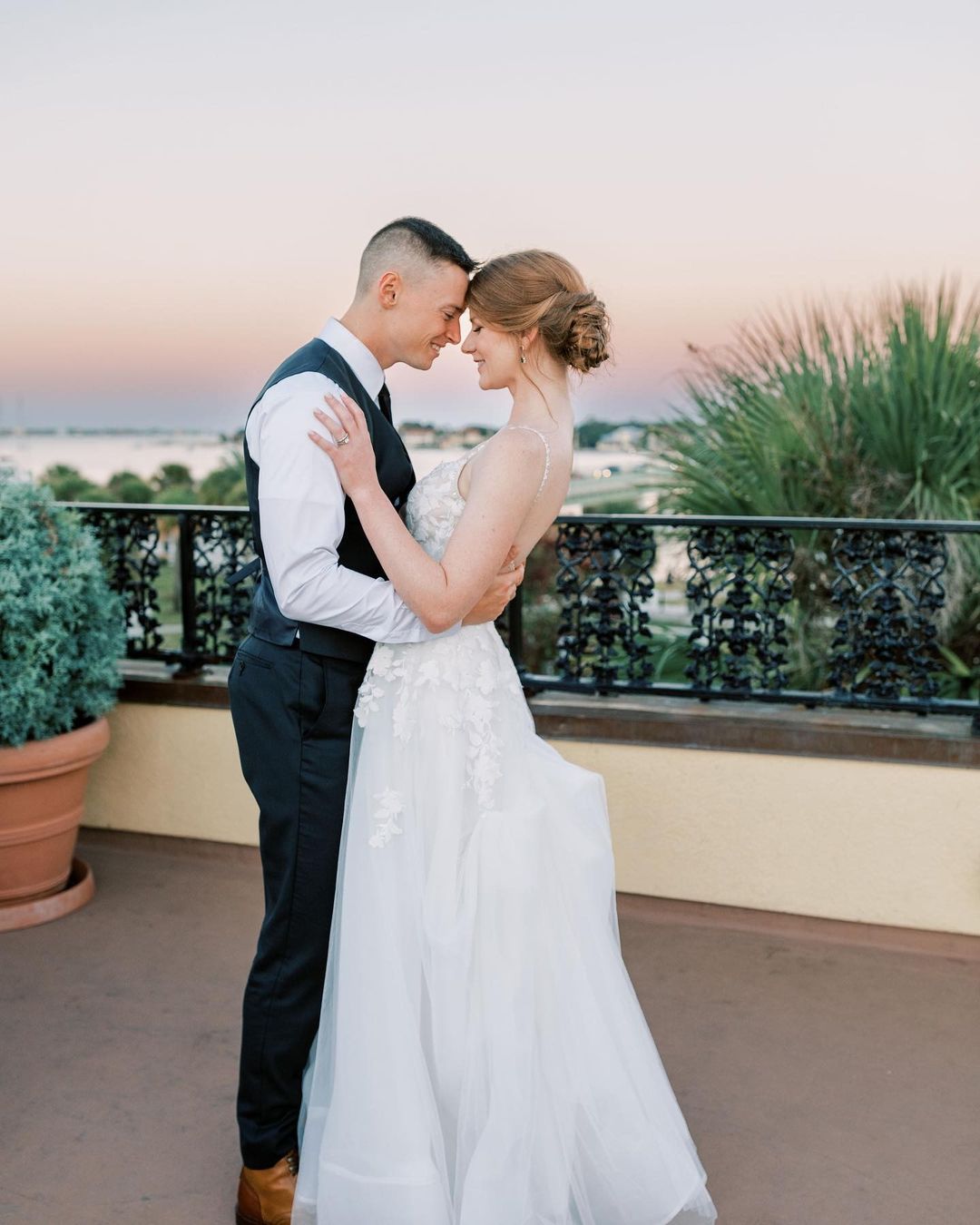 best wedding venues in florida bride and groom in dark gray outfit