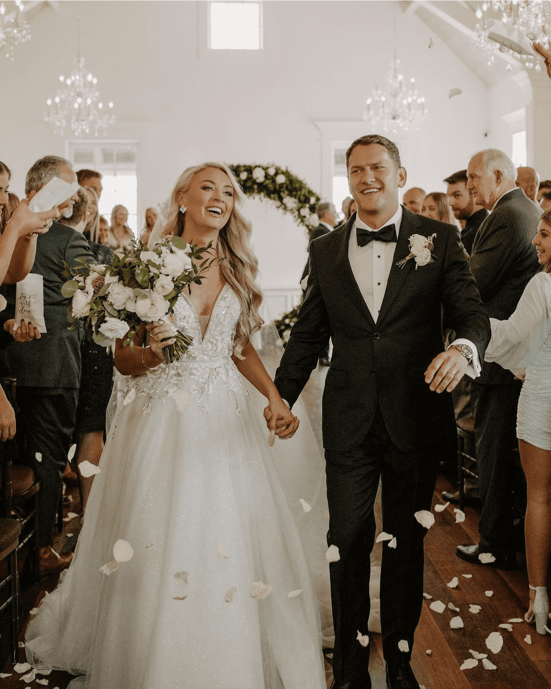 best wedding venues in florida groom and bride with flowers