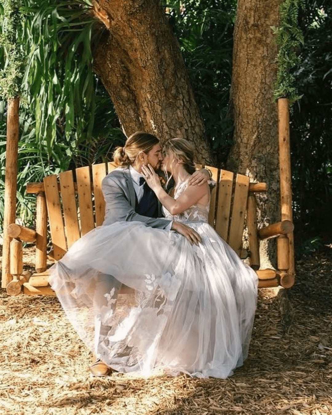 best wedding venues in florida newlyweds on the wooden swing