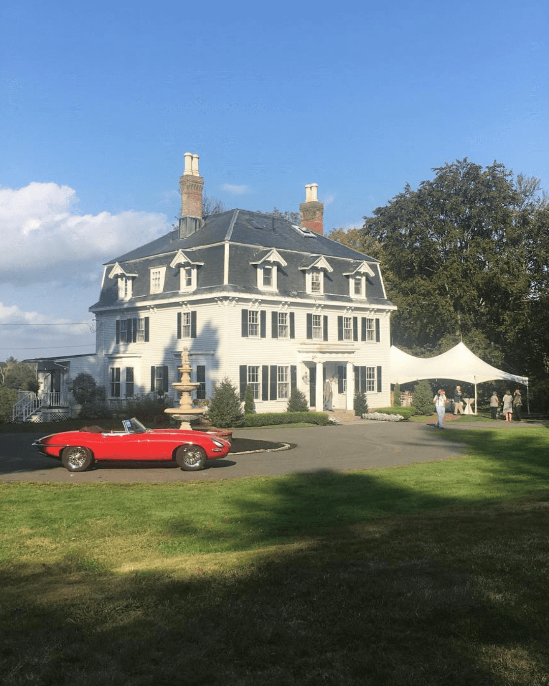 best wedding venues in new england yard with red car