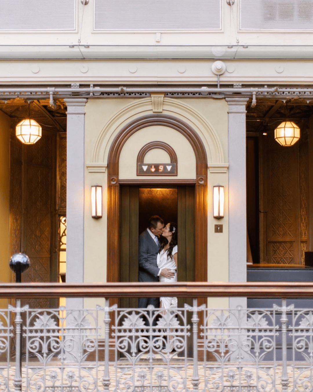 best wedding venues in new york newlyweds kissing in the hall
