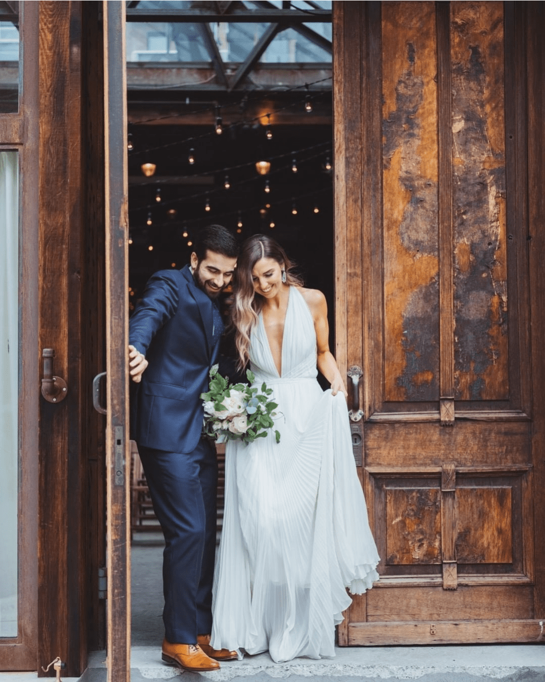 best wedding venues in new york newlyweds leaving the building