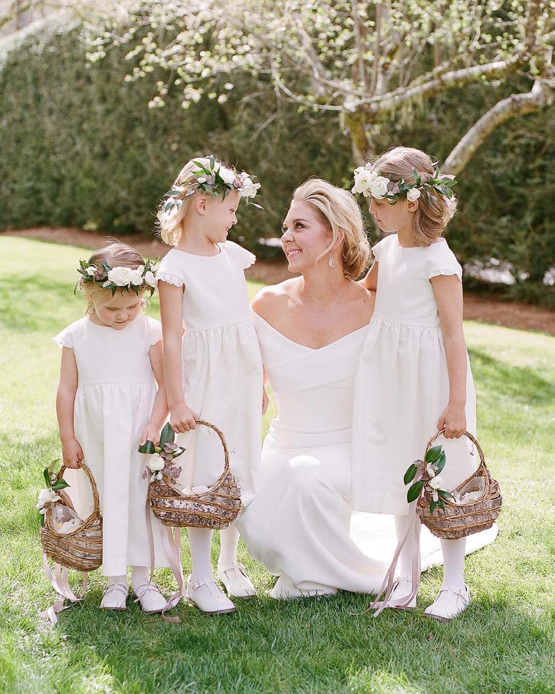 flower girl and ring bearer photo with bride moment mcsweenphotography