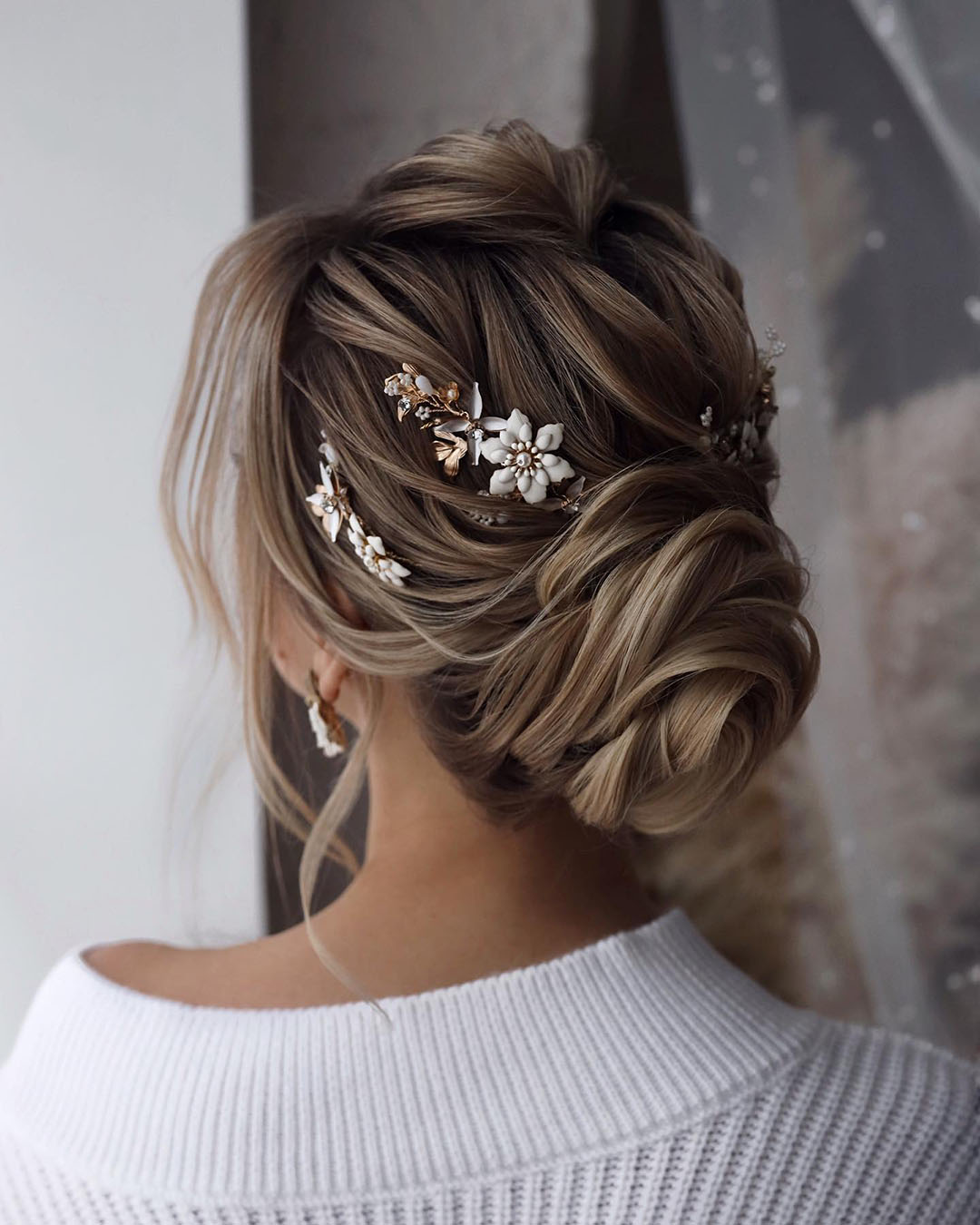wedding updos for long hair classy updo with flowers tonyastylist