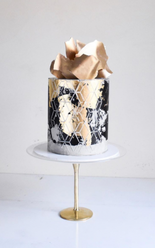 black and gold cakes with white color one layer
