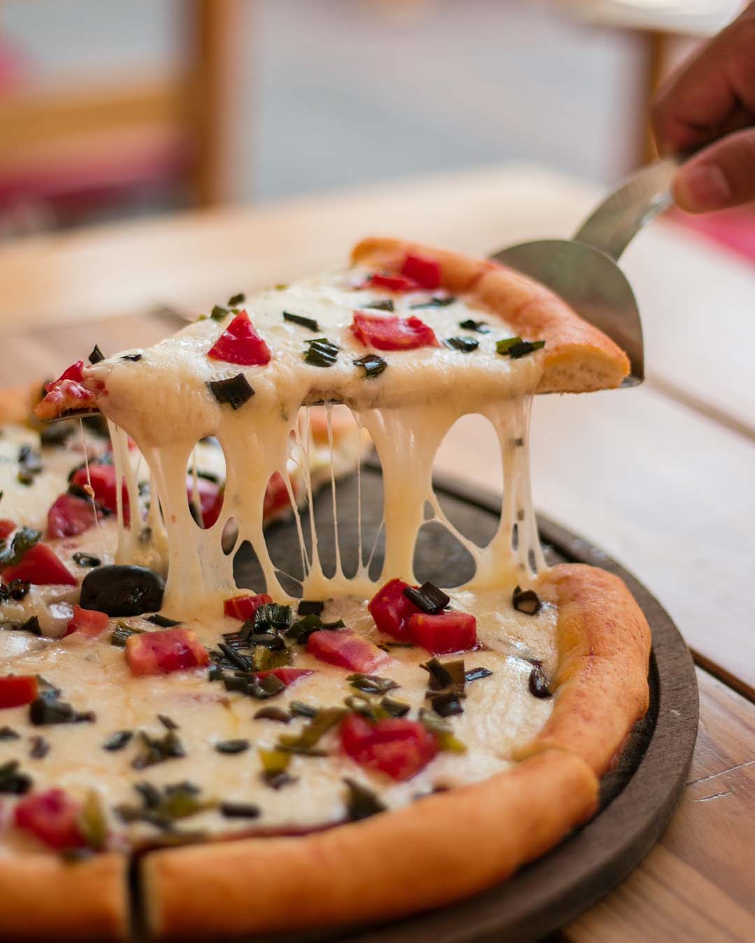 wedding food ideas pizza with melted cheese nicolas perondi unsplash