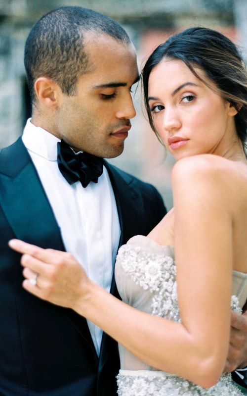 https://www.weddingforward.com/wp-content/uploads/2023/02/what-men-want-the-most-in-a-wife-groom-bride-passionate-look-jannabrowndesignco.png